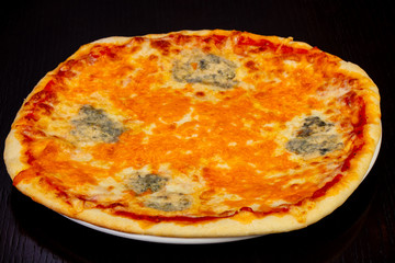 Delicious 4 cheese pizza