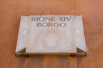 Decorative street name sign in Rome, Italy
