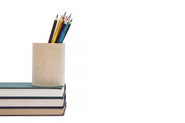 Fototapeta premium colored books and pencils, back to school concept