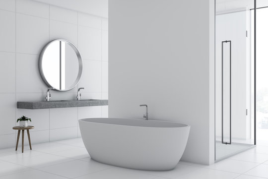 White bathroom inteiror, tub and shower