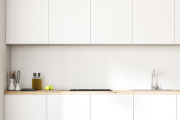 White kitchen countertops and closets close up