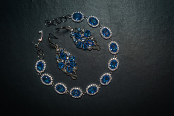 Silver bracelet and earring with tanzanite