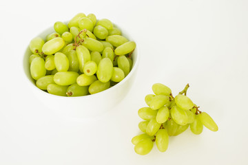green grape in bowl diet fruit organic on white background
