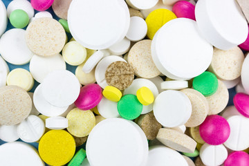 pills on a blue background