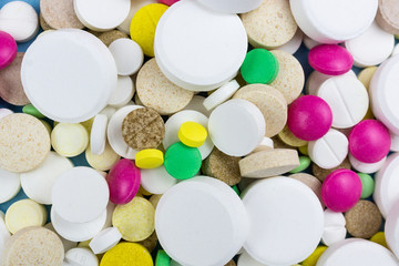 pills on a blue background