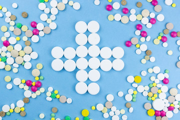 pills on a blue background