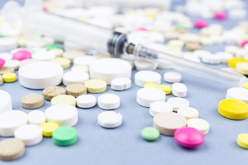 pills on a blue background