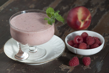 Smoothies of raspberries and nectarines with yogurt