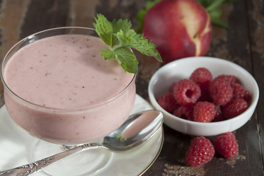 Smoothies of raspberries and nectarines with yogurt