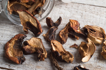 Dried mushrooms on the wooden table