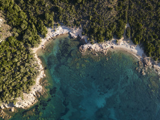 Fototapeta na wymiar View from above, aerial view of a rocky coast bathed by an emerald and transparent Mediterranean sea, Costa Smeralda, Sardinia, Italy