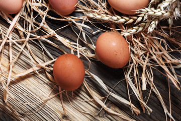 Egg. Fresh farm eggs on a wooden rustic background