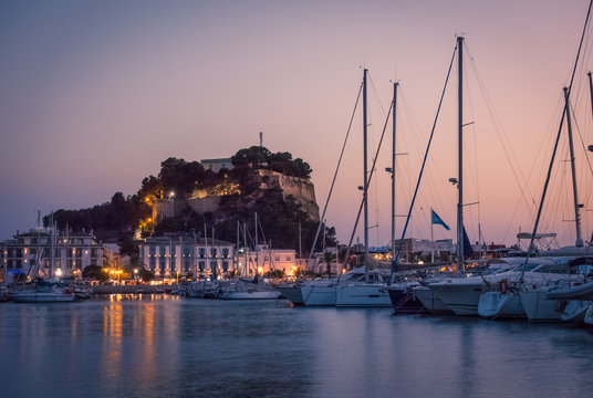 Denia Marina at sunset, with the famous medieval castle on the background. Alicante, Spain.