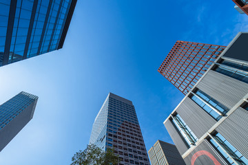 Fototapeta na wymiar Modern office building against blue sky.