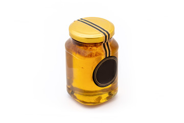 Honey in Glass Jar Isolated on White Background