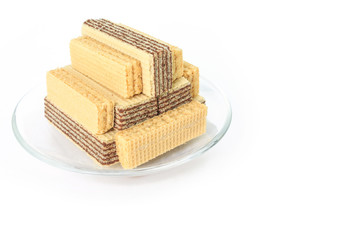 wafer chocolate milk dessert  on glass plate on white background
