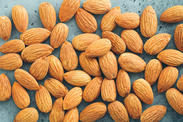 Fresh almond nuts. Top view. Food background.