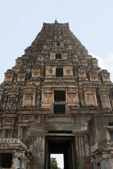 Naklejka premium The main entrance tower or the east facing giant tower, Gopura, Virupaksha Temple, Hampi, karnataka. Sacred Center. View from the east.