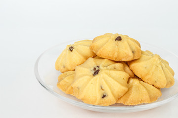 chocolate chip cookies biscuits on plate on white background