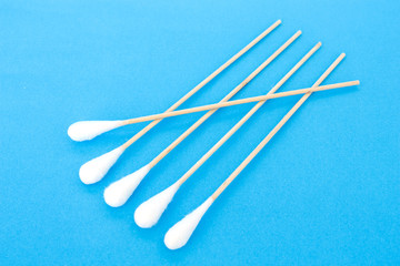 cotton bud, swab clean healthcare top view on blue background