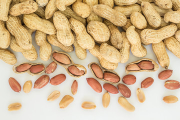 peanut in shell frame border top view on white background