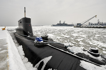 Small submarine in the winter port