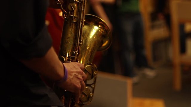 A saxophone player in a jazz band.