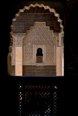 decorated windows and doorframes at Ben Youssef Madrasa in Marrakech, Morocco