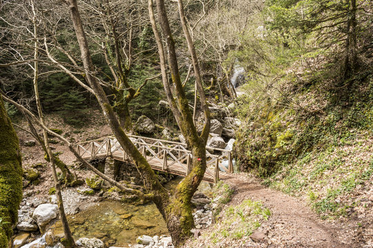 Wooden bridge on the path of Mavri Spilia - Black Cave, close to Proussos village
