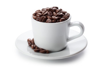 Cup full of delicious roasted coffee beans, isolated on white background