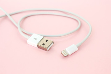 usb cable port charger on pink background