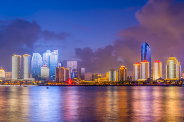 Fototapeta na wymiar The night scene of modern urban architectural landscape in Qingdao, China