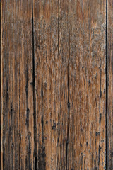 Old brown wooden background or wallpaper. Vertical image.
