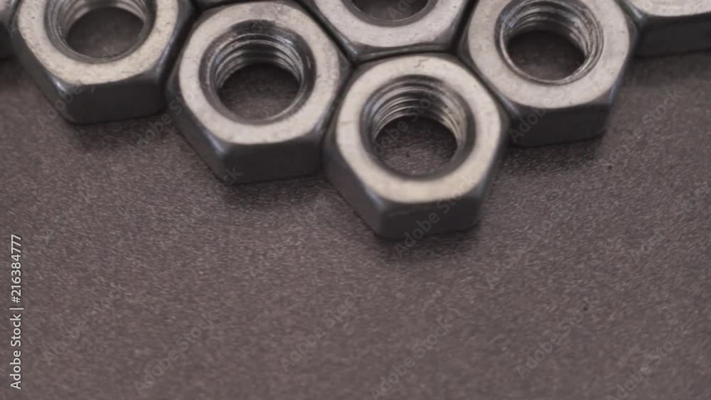 Poster Screw-nut rotation 360 degrees. Macro view.