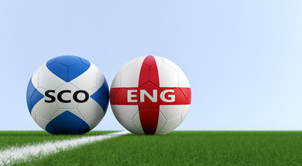 Scotland vs. England Soccer Match - Soccer balls in Scotland and England national colors on a soccer field. Copy space on the right side - 3D Rendering  © Marius Faust
