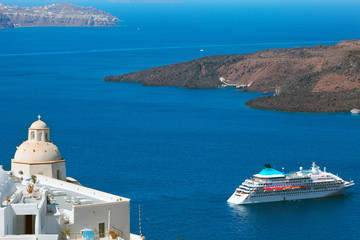 Greek island crossed by a cruise ship beautiful view, Santorini, Greece