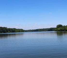 A clear sky morning at the lake in the park.