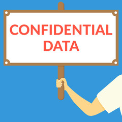 CONFIDENTIAL DATA. Hand holding wooden sign