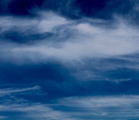 Fototapeta na wymiar The streaky white cloudscape in the blue skies. 