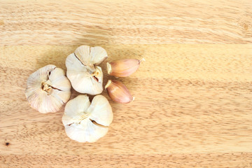 garlic vegetable ingredient food top view on wood background