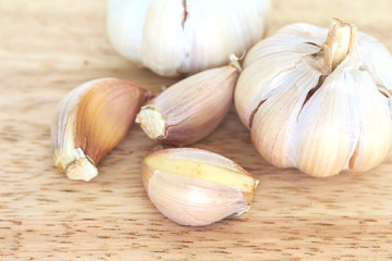 garlic vegetable ingredient food top view on wood background