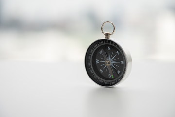 Compass on the white table