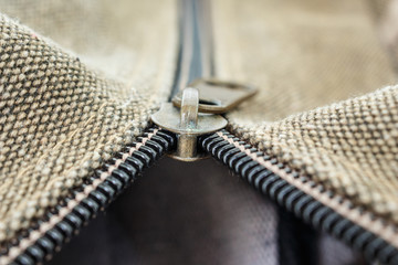 zipper clothing brown jacket macro pattern background © angintaravichian
