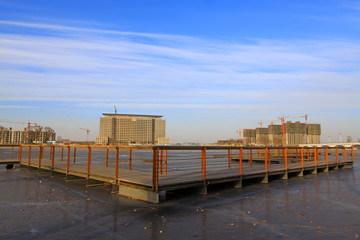 Fototapeta premium river scenery in a park in winter