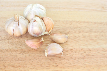 garlic vegetable ingredient food top view on wood background