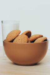 Cookies with a glass of milk on the table.