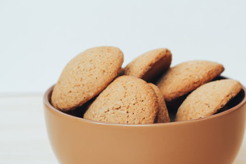 Cookies with a glass of milk on the table.