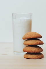 Cookies with a glass of milk on the table.
