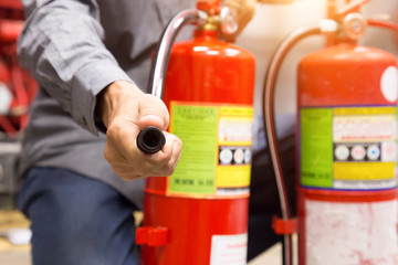 Engineer inspection Fire extinguisher in control room.