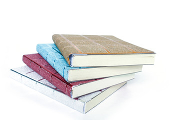 stack of books on white background